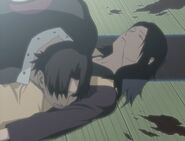 Mikoto lies dead with her husband.