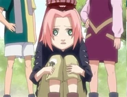 Sakura becomes frighten as she hears Ami right behind her.