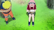 Sakura also decides to share her food with Naruto.