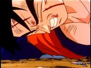 Future Gohan struggles to get up after losing his right arm from the bombing incident.