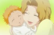 Masaki with her first child, Ichigo Kurosaki.