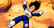 Vegeta unconscious laying on the ground and survived from the Spirit Bomb