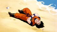 Goku is down and hurt