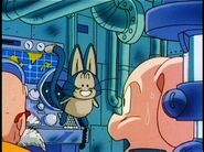 Future Master Roshi looking at Future Puar getting scolded by Oolong.