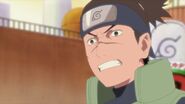 Iruka tells Naruto that he almost got himself kill, while being in the back hills.