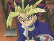 Yami Yugi loses life points in a duel