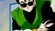 Gohan gives a senzu bean to Videl