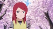 Kushina's reaction after she is called an outsider by her classmate's older brother.