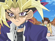 Yami Yugi sees Weevil hold the Seal of Orichalcos card