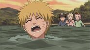 Naruto comes out of the water.