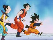 Gohan running to Goku