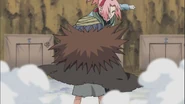 Sakura defeats the Yota clone.