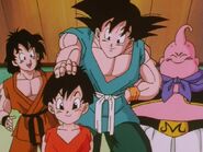 Pan is congratulated by Goku