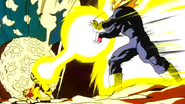 Gohan fires a series of Kamehameha waves in an attempt to destroy Majin Buu's cocoon