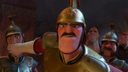 The Stabbingtons watching Maximus reveal a secret tunnel within the restaurant.