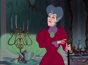 Lady Tremaine listening to the Grand Duke read a royal proclamation.