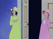 After having told her mother, Anastasia waits with her sister, Drizella to see Cinderella get punished.