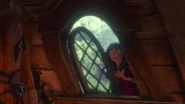Opening a window, Gothel overhears Rapunzel singing how happy she is for leaving her tower.