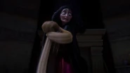 Gothel horrified to watch Rapunzel's hair turn brown and lose its magical powers forever.