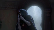 A hysteric Gothel hiding herself in cloak.