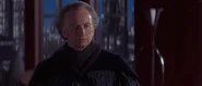 Palpatine watching Queen Amidala leave to go overthrow the Trade Federation's control over Naboo.
