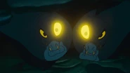 Flotsam and Jetsam using their magical eyes so their mistress, Ursula can see what they're seeing.
