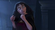 Gothel noticing something shiny underneath the staircase.