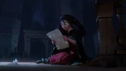 Upon further investigating, Gothel discovers a wanted poster inside the satchel.