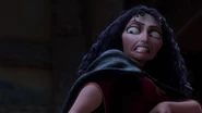 Gothel forcibly dragging Rapunzel.