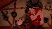 Gaston going to punch LeFou for his clumsiness.