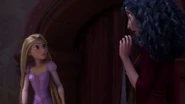 Gothel surprised when Rapunzel pushes her away, having just realized she was never her mother, but her kidnapper.