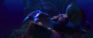 Tamatoa trying to stop Moana and Maui from escaping.