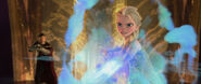 Elsa using her powers to restrain Francis as Erik looks upon.