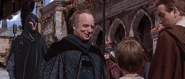Palpatine meets Anakin for the first time promising to watch his career with great interest.