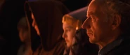 Palpatine eerily watching Qui-Gon's Jedi funeral.