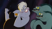 Flotsam and Jetsam satisfied when Ursula informs them she's got Ariel in her grasp.