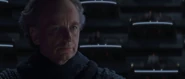 Palpatine watching Queen Amidala speak out against the Senate, calling for a vote of no confidence towards Chancellor Valorum.