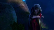 Gothel approaching the exit, armed with her dagger as she expects Rapunzel and Flynn to come out.