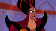 Jafar watching the Sultan take a liking to Prince Ali, deeming him to be a good match to his daughter.