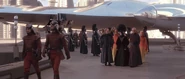 Palpatine talking to Queen Amidala.