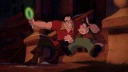 Gaston using the Enchanted Mirror to show LeFou the Beast.