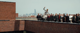 Tris, on the roof to jump down to the Dauntless compound.