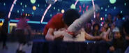 Greg Heffley accidentally face planting onto Taylor Pringle's cake while knocking the cake's rocket ship off.