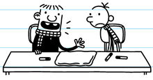 Greg and Rowley coming up ideas on making a flag for the snow fort