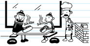 Greg and Rowley warming up with the meatball subs in the pizza place