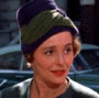 Sra. Emily Eustace "2E" Failenson (Patricia Neal) en Desayuno en Tiffany's.