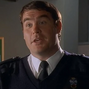 Sargento Mark Millow en Doc Martin.