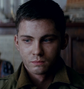 Norman Ellison (Logan Lerman) en Corazones de hierro.