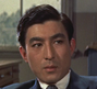 Inspector Tominaga (Akihiko Hirata) en El hombre H