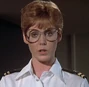 Teniente comandante Maggie Poole (Jean Bruce Scott) en Magnum (temps. 7-8).